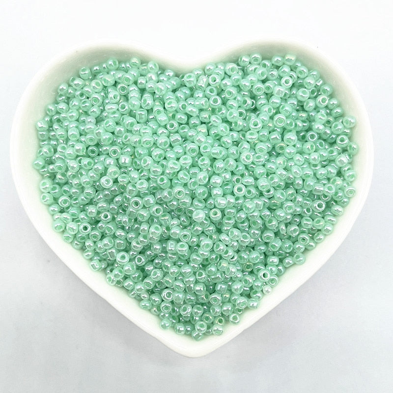 Effect of The Cream Charm Czech Glass Seed Beads