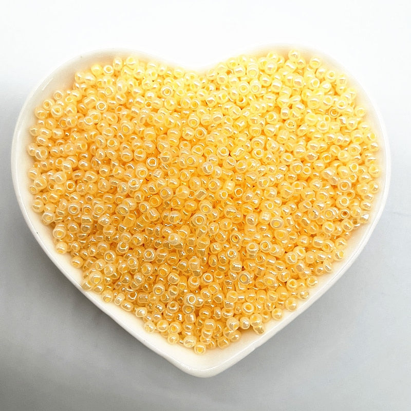 Effect of The Cream Charm Czech Glass Seed Beads