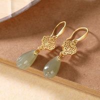 Original natural Hetian jade fresh orchid earrings