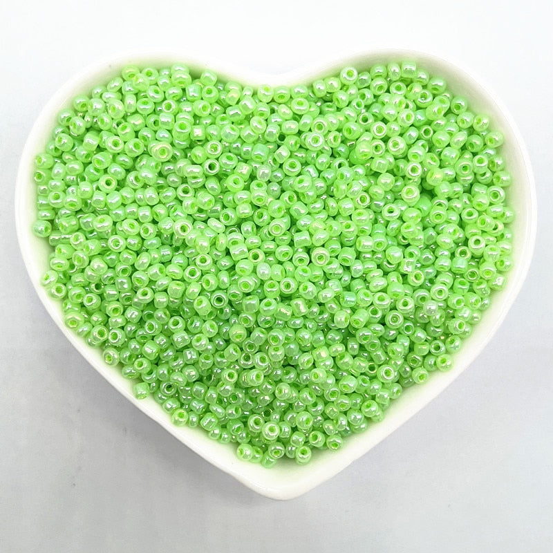 Effect of The Cream Charm Czech Glass Seed Beads