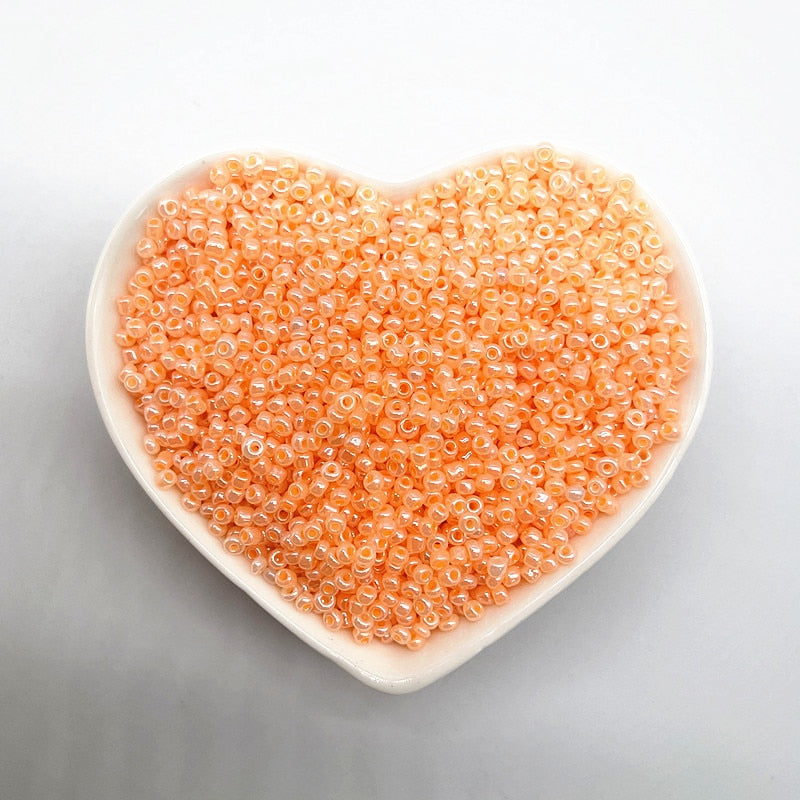 Effect of The Cream Charm Czech Glass Seed Beads