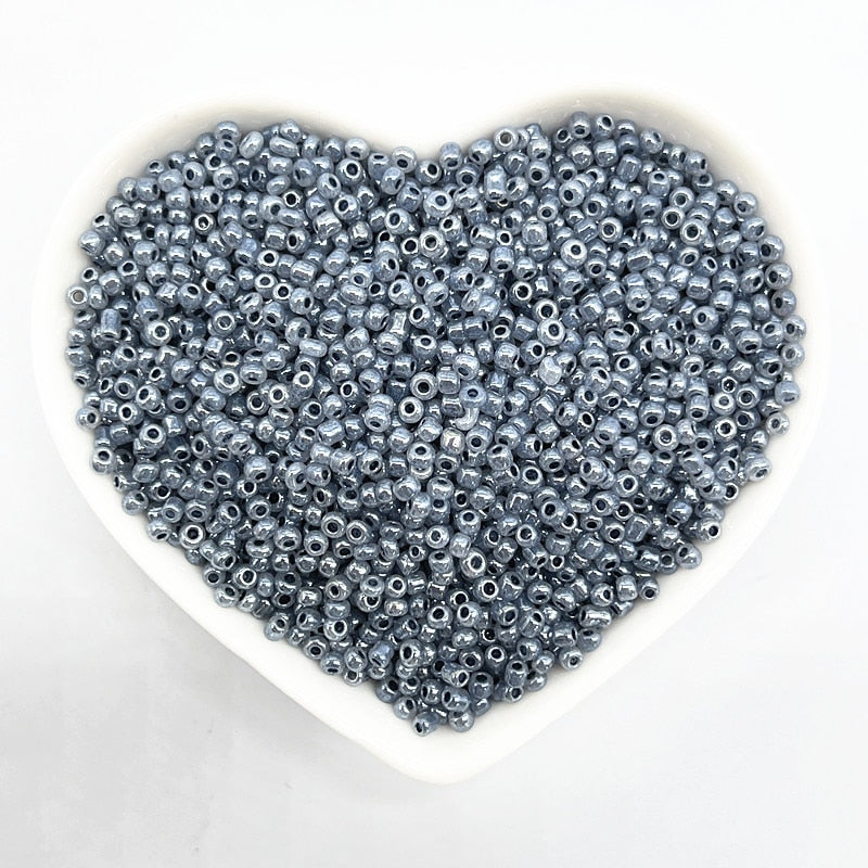 Effect of The Cream Charm Czech Glass Seed Beads