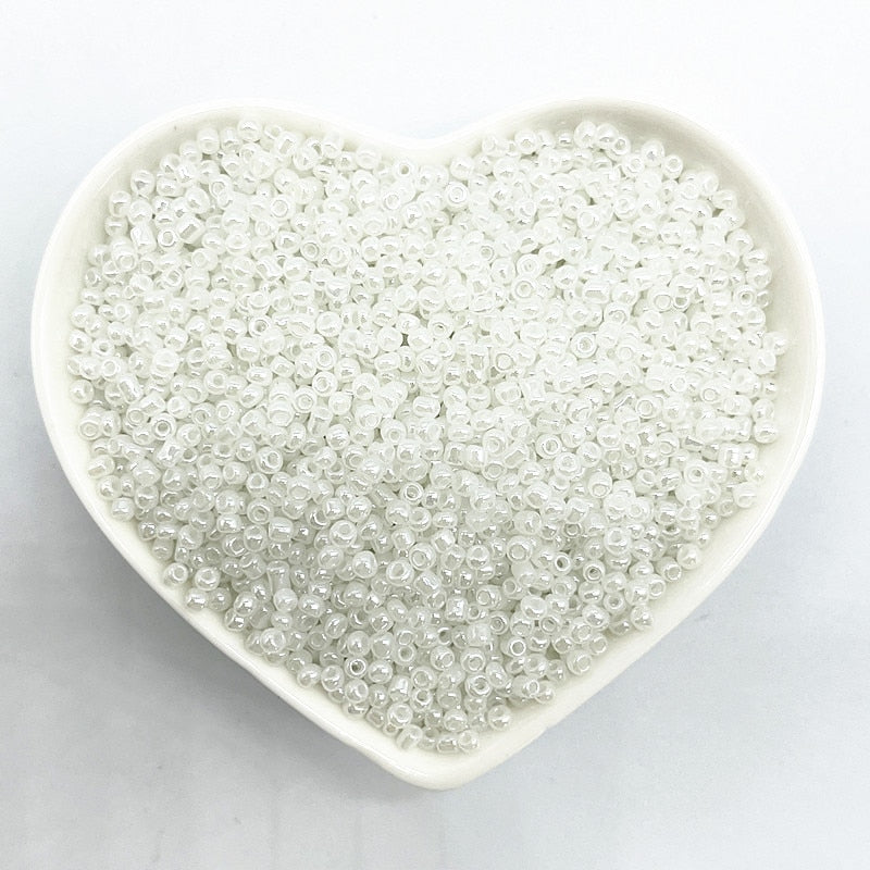 Effect of The Cream Charm Czech Glass Seed Beads