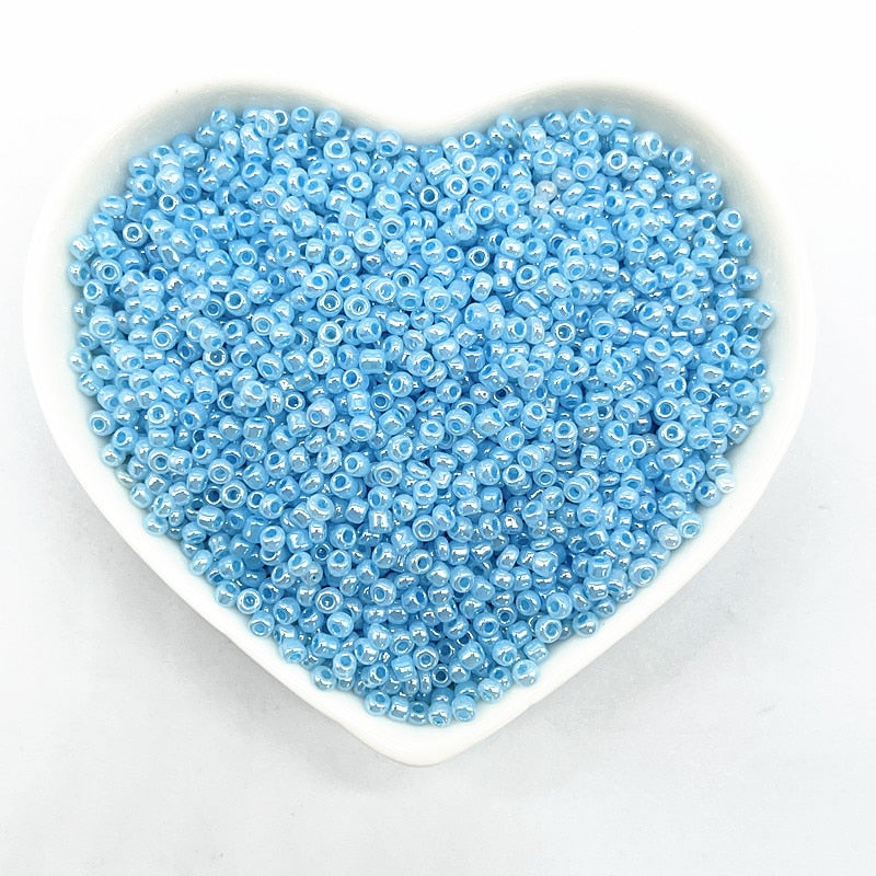 Effect of The Cream Charm Czech Glass Seed Beads