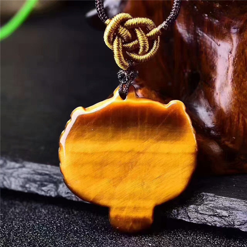 Natural Yellow Eye Stone Jade Tiger Head Pendant
