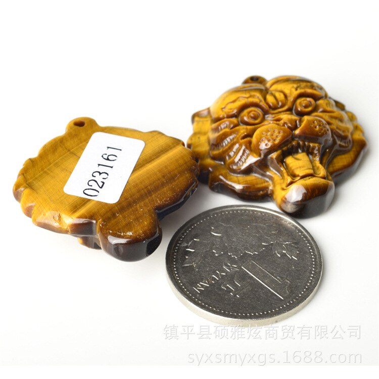 Natural Yellow Eye Stone Jade Tiger Head Pendant