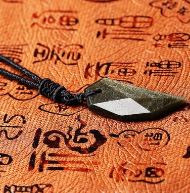 Natural Sands Obsidian Calendula Wolf Tooth Pendant