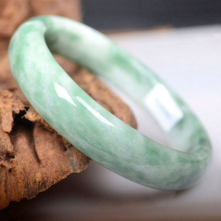 Floating green jade bracelet