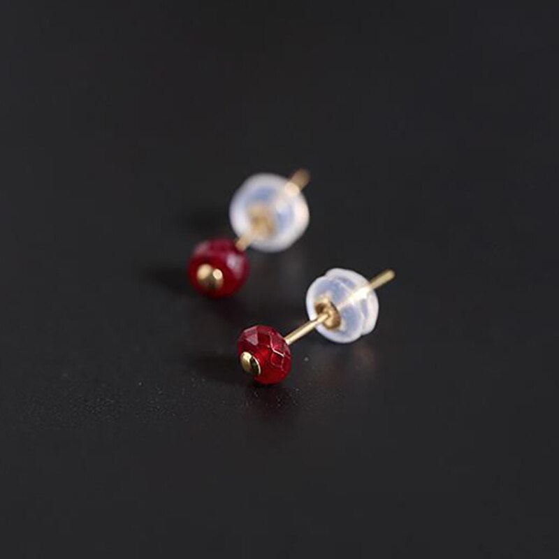 Creative natural silver inlaid ruby earrings