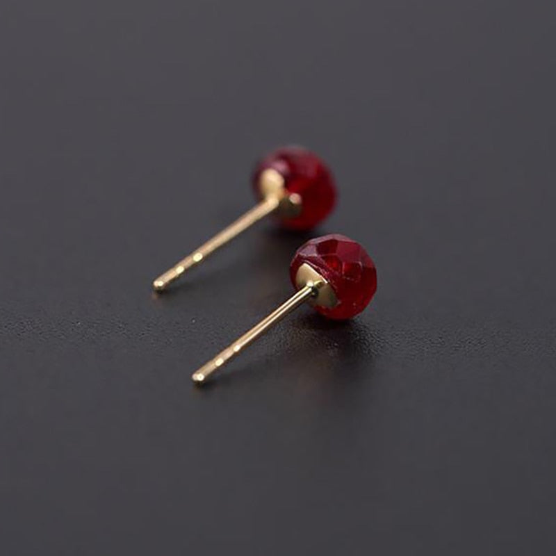 Creative natural silver inlaid ruby earrings